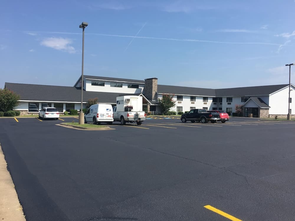 Regency Inn And Suites featured exterior or lobby in Stilwell, OK — similar hotel