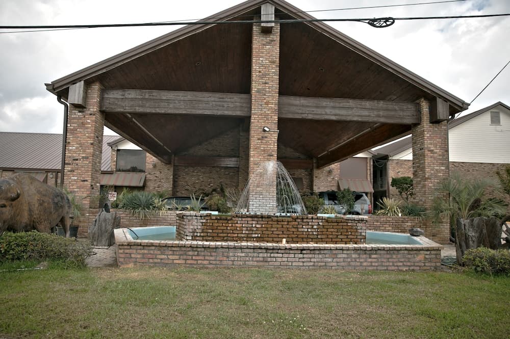 Western Inn featured exterior or lobby in Hammond, LA — similar hotel