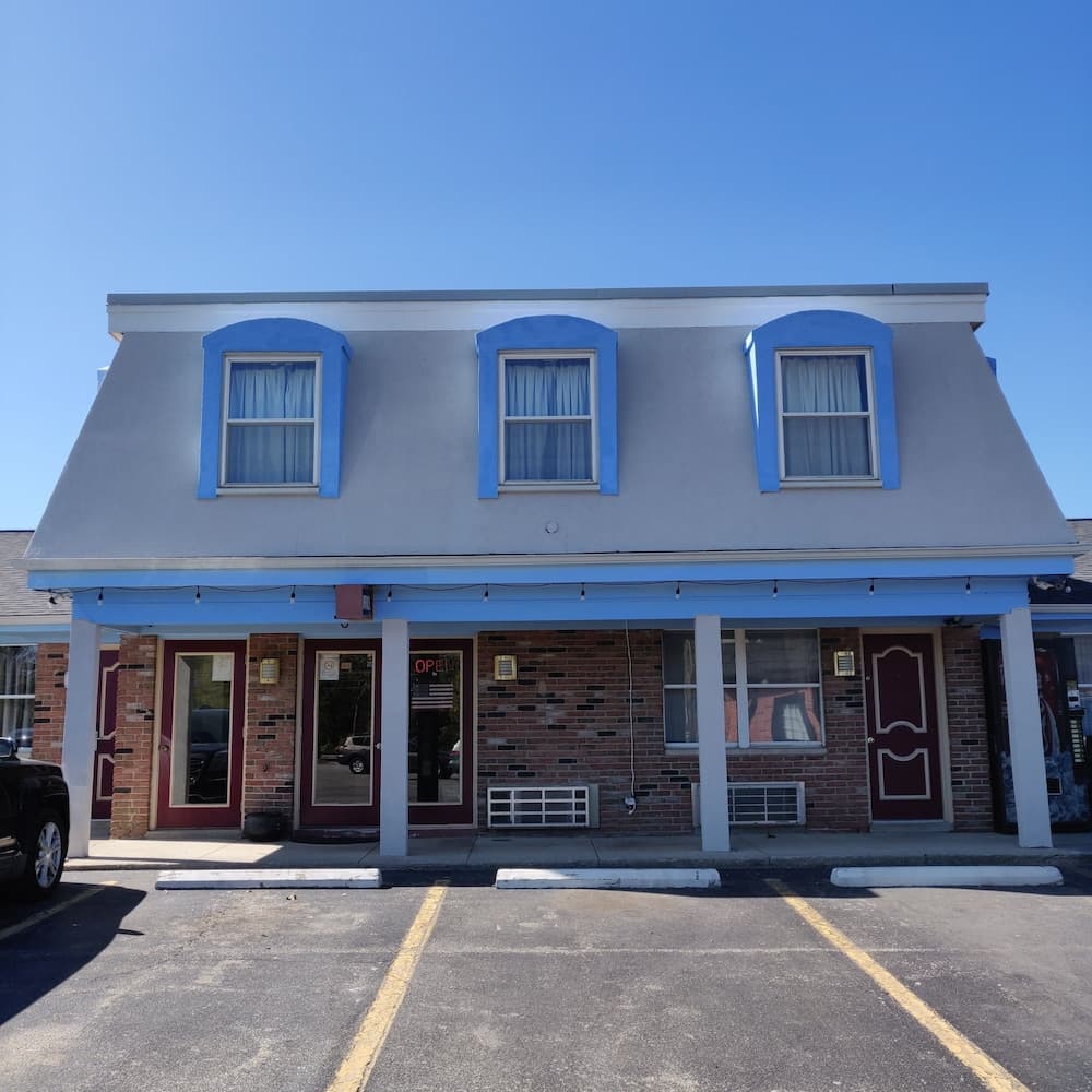 Travel Inn Delaware featured exterior or lobby in Delaware, OH — similar hotel