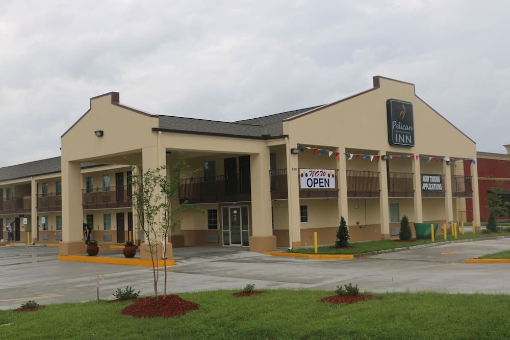 Pelican Inn featured exterior or lobby in Gonzales, LA — similar hotel