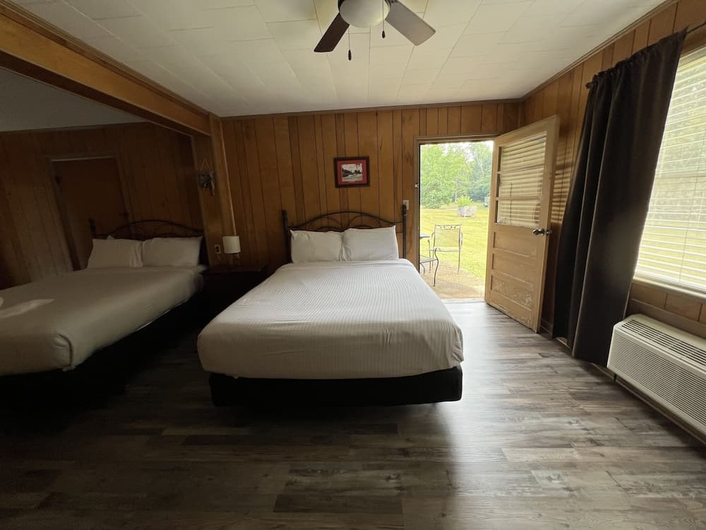 Budget friendly queen studio with full kitchen, two queen beds and sleeper sofa by RedAwning interior in Mount Ida, AR — gallery photo 2