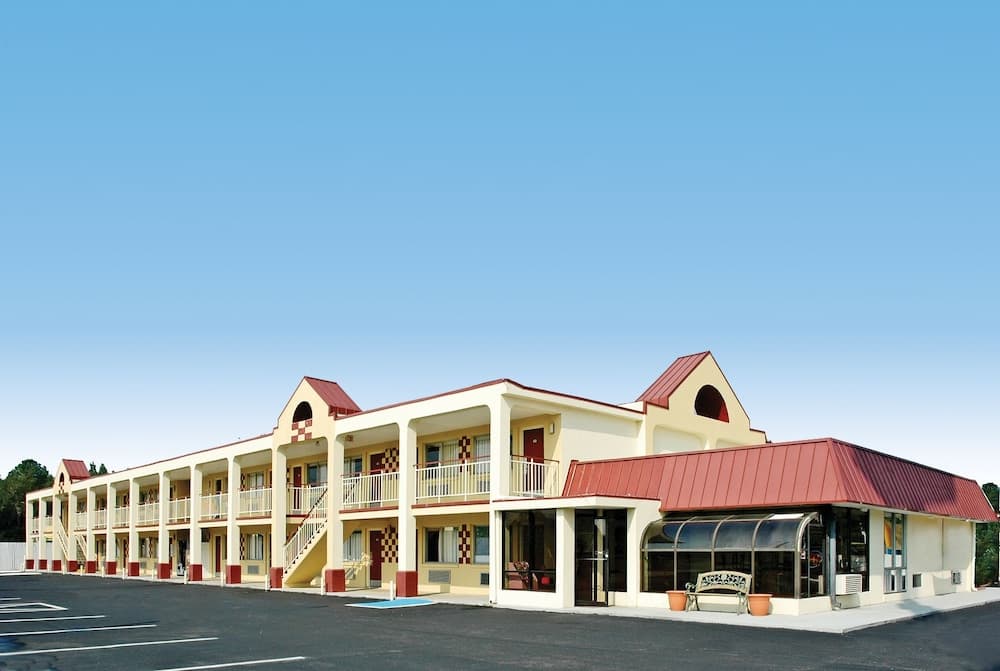 Economy Inn featured exterior or lobby in Dillon, SC — similar hotel