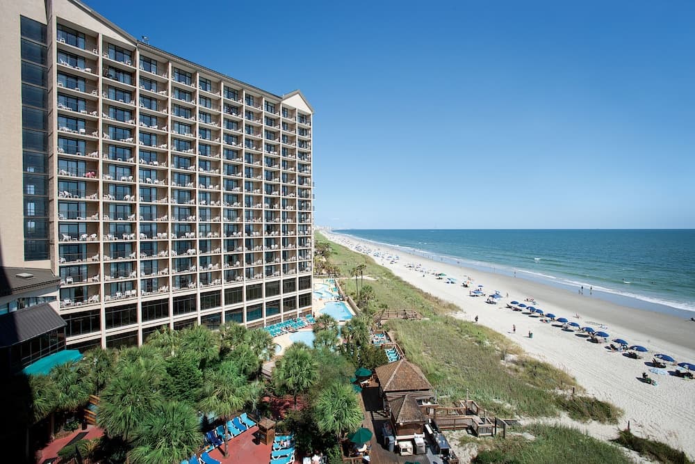 Beach Cove Resort featured exterior or lobby in North Myrtle Beach, SC — similar hotel