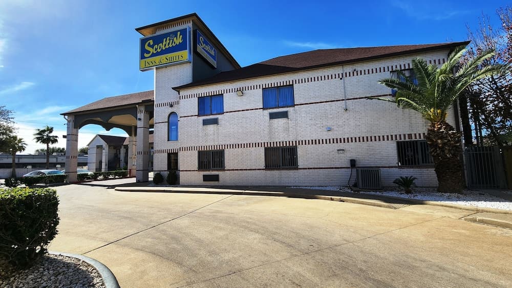 Scottish Inns & Suites Sam Houston Pkwy featured exterior or lobby in Houston, TX — similar hotel