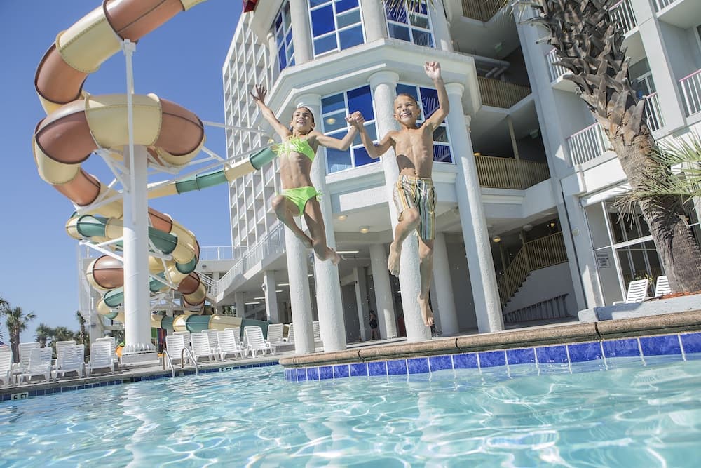 Crown Reef Beach Resort and Waterpark featured exterior or lobby in Myrtle Beach, SC — similar hotel