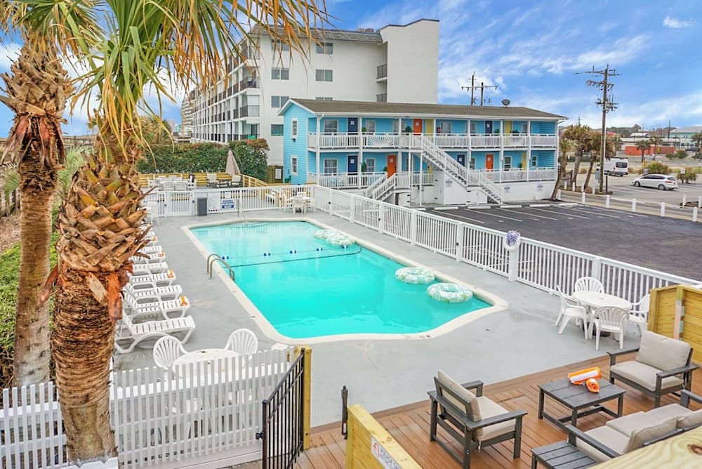 Boardwalk Inn featured exterior or lobby in Carolina Beach, NC — similar hotel