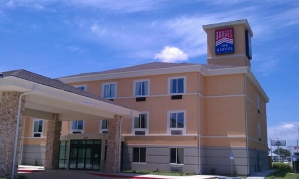 Budget Inn and Suites featured exterior or lobby in Ganado, TX — similar hotel