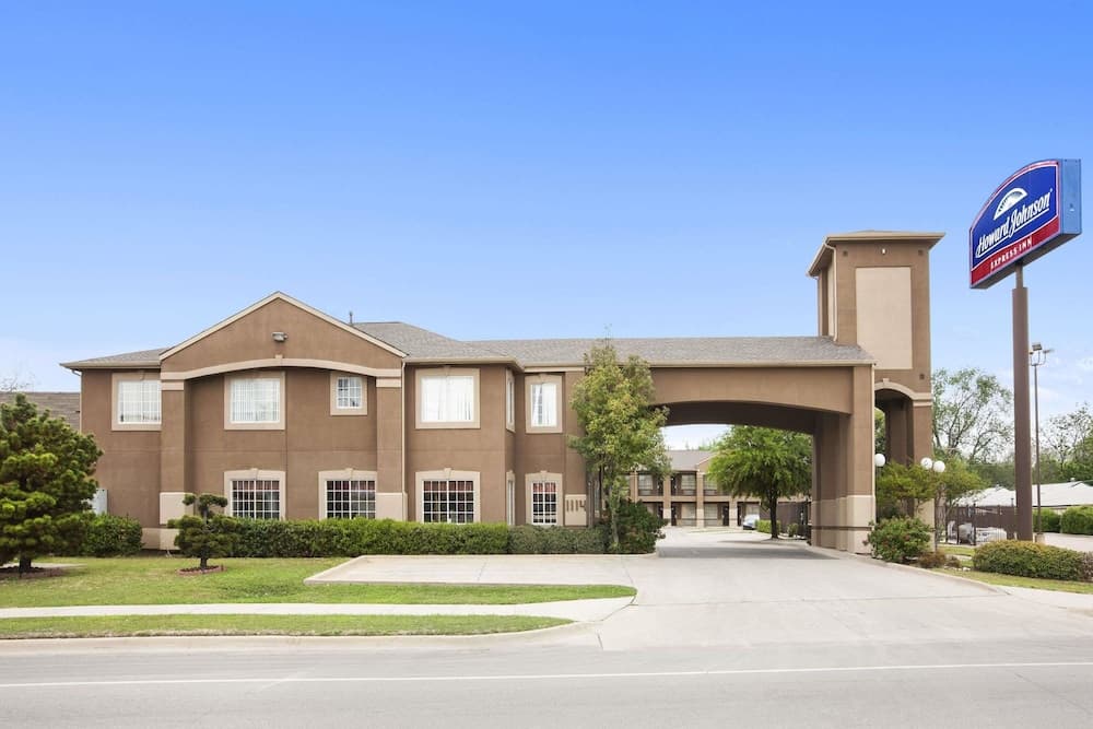 Howard Johnson by Wyndham Grand Prairie Near Lone Star Park exterior or lobby in Grand Prairie, TX — main listing photo