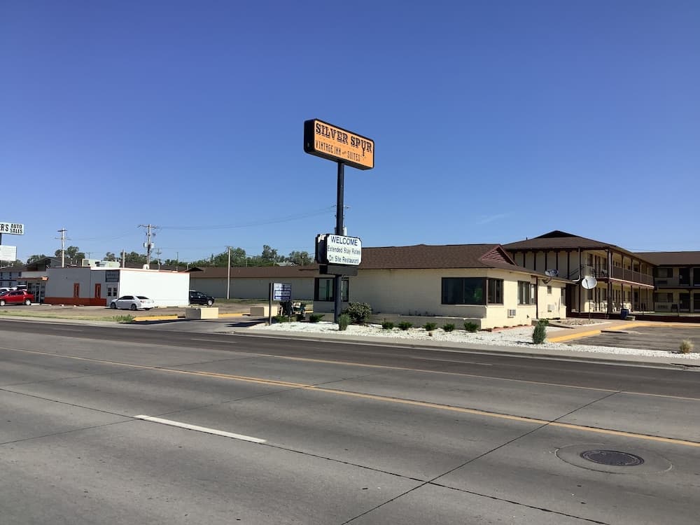 Silver Spur Vintage Inn & Suites exterior or lobby in Dodge City, KS — main listing photo