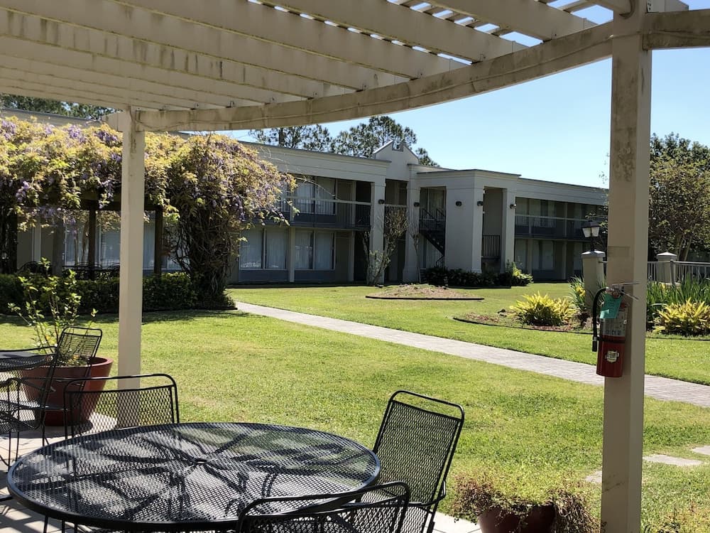 Ramada by Wyndham New Iberia featured exterior or lobby in New Iberia, LA — similar hotel