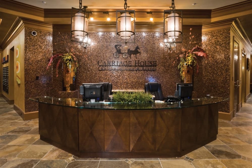 Carriage House Hotel interior in Lafayette, LA — gallery photo 2