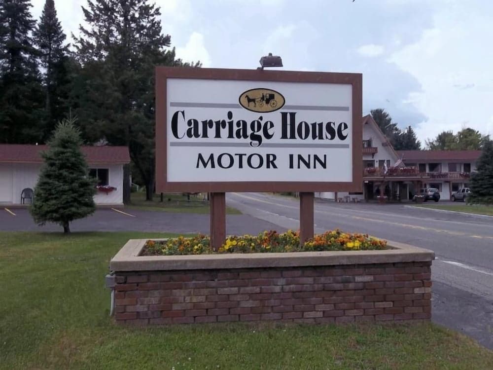 Carriage House Motor Inn featured exterior or lobby in Lake Placid, NY — similar hotel