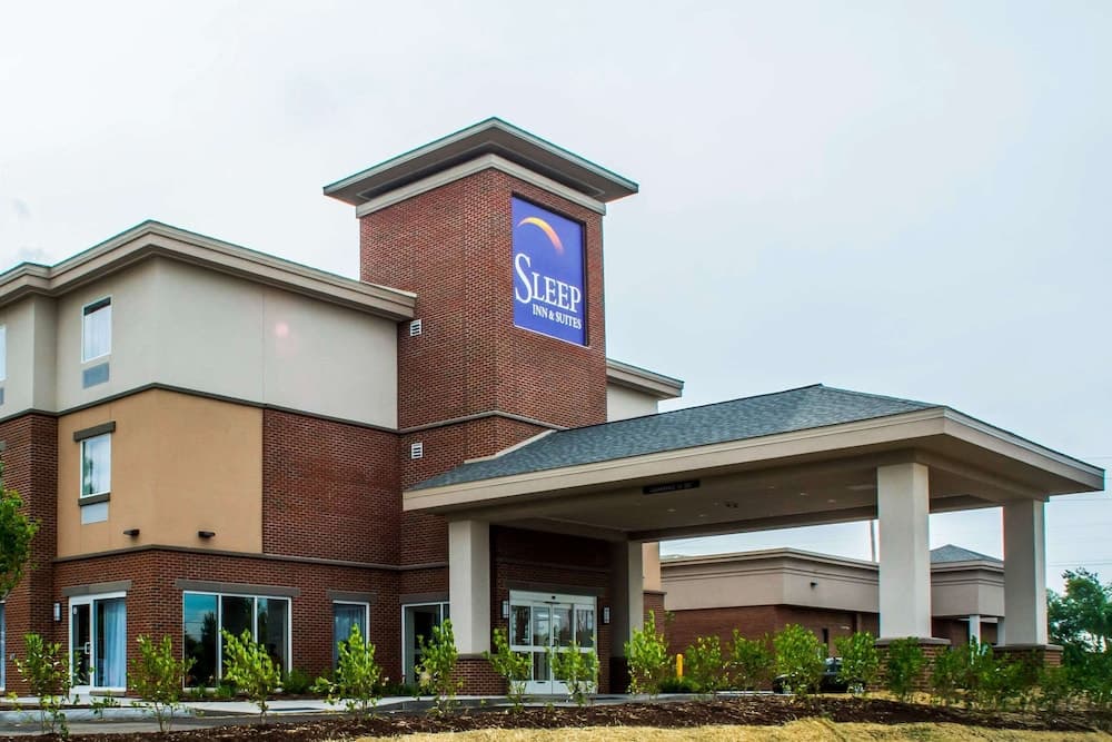 Sleep Inn & Suites Syracuse Airport featured exterior or lobby in East Syracuse, NY — similar hotel