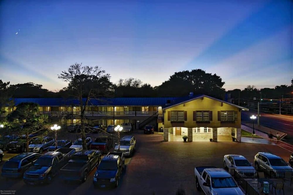 Sunday House Inn and Suites featured exterior or lobby in Fredericksburg, TX — similar hotel