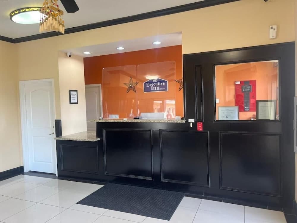 Executive Inn & Suites featured exterior or lobby in Pittsburg, TX — similar hotel