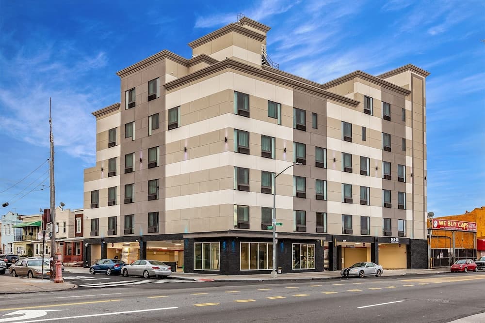 Van Wyck Hotel & Suites Near JFK Airport featured exterior or lobby in Jamaica, NY — similar hotel