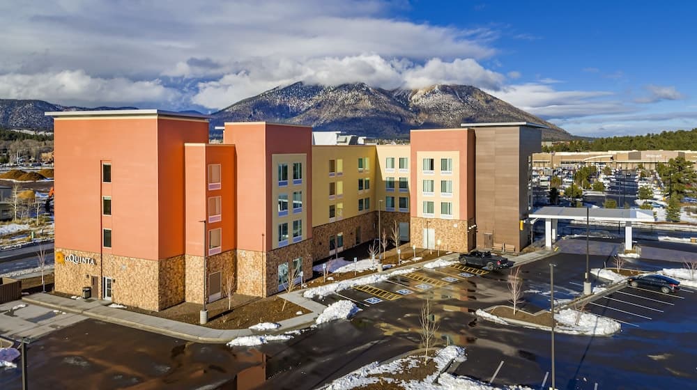 La Quinta Inn & Suites by Wyndham Flagstaff East I-40 featured exterior or lobby in Flagstaff, AZ — similar hotel