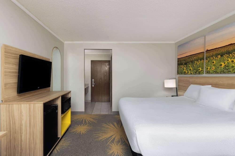 Days Inn & Suites by Wyndham Kansas City South featured exterior or lobby in Kansas City, MO — similar hotel