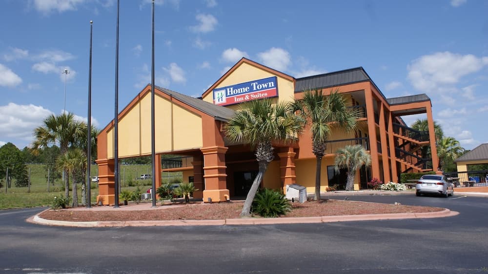HomeTown Inn & Suites featured exterior or lobby in Crestview, FL — similar hotel