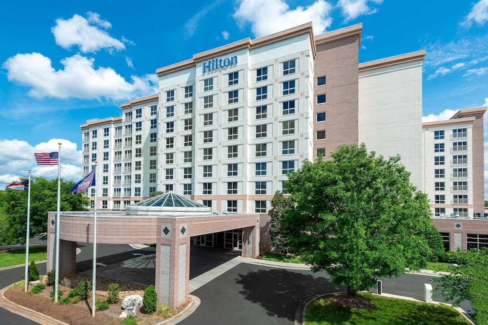 Hilton Charlotte Airport featured exterior or lobby in Charlotte, NC — similar hotel