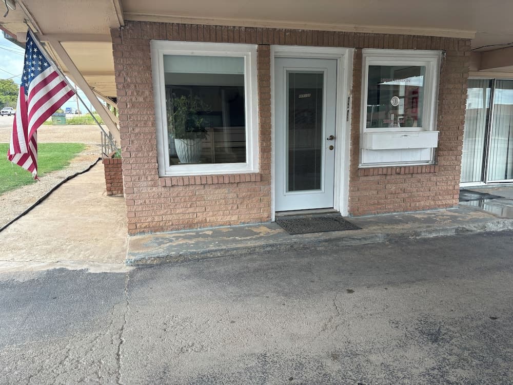 Budget Inn featured exterior or lobby in Nocona, TX — similar hotel