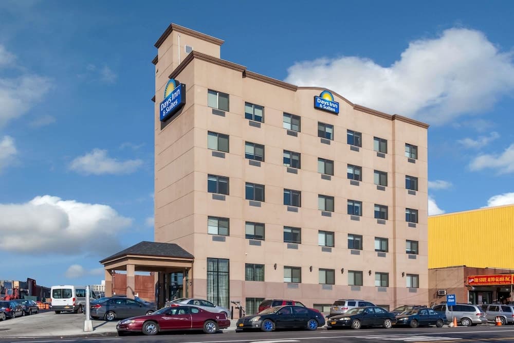 Days Inn & Suites by Wyndham Jamaica JFK Airport featured exterior or lobby in Jamaica, NY — similar hotel