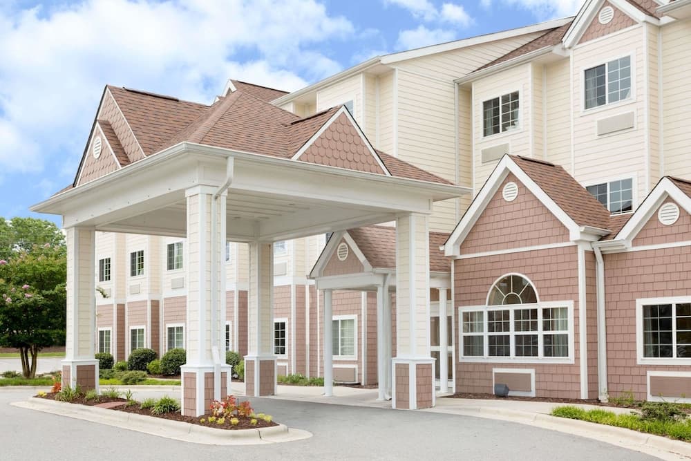 Microtel Inn & Suites by Wyndham Greenville/University Medic featured exterior or lobby in Greenville, NC — similar hotel