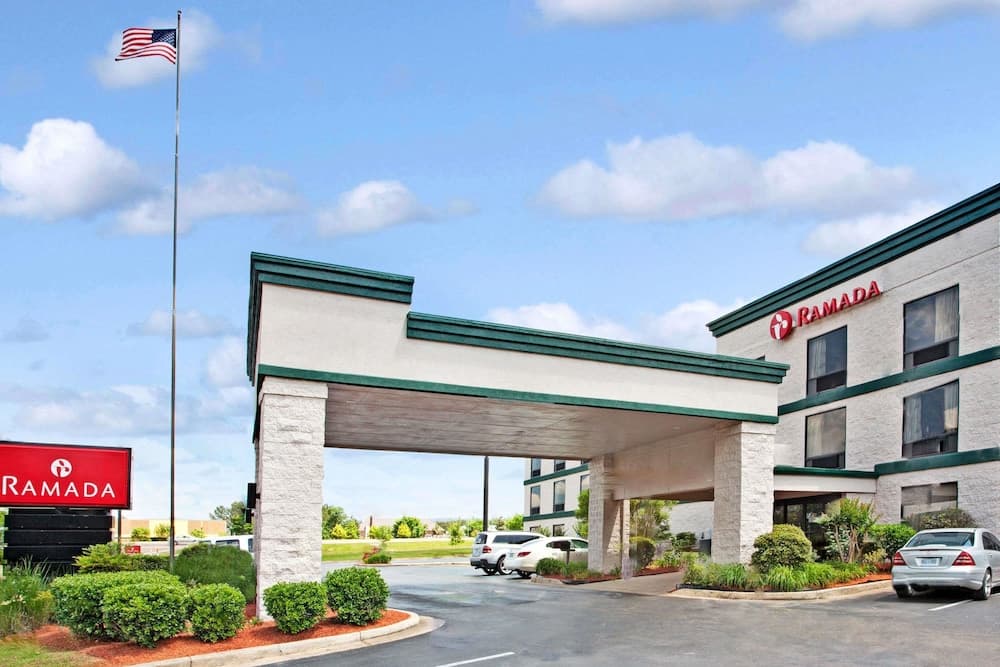 Ramada by Wyndham Pearl/Jackson Airport featured exterior or lobby in Pearl, MS — similar hotel