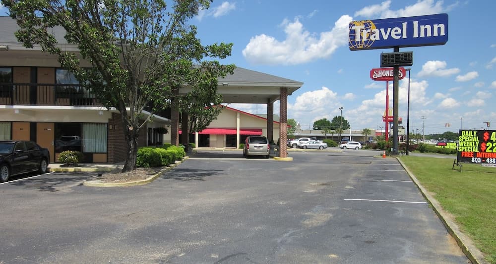Travel Inn featured exterior or lobby in Lugoff, SC — similar hotel