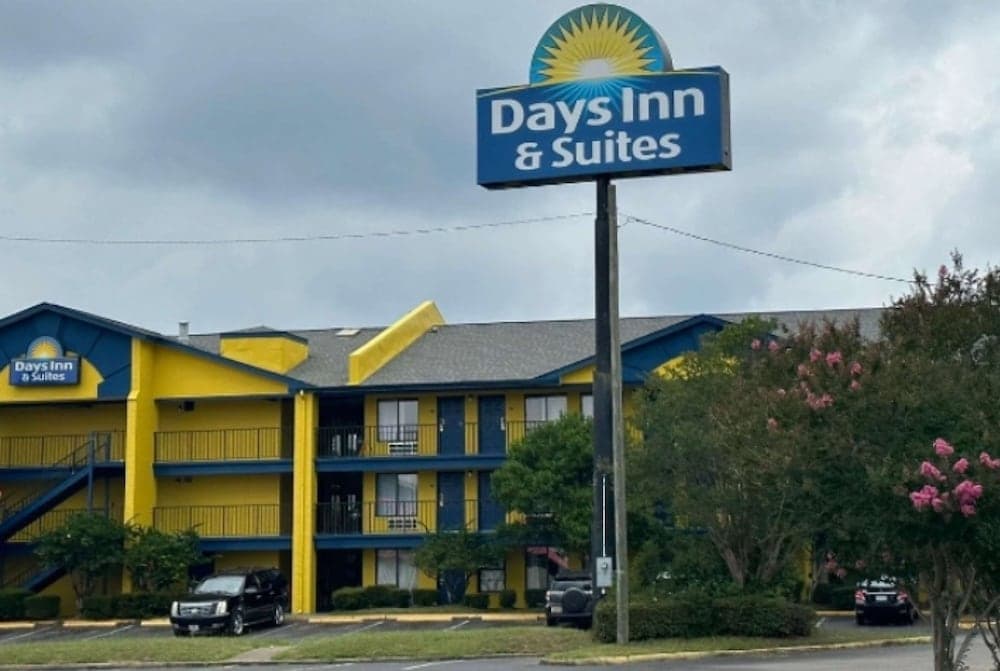 Days Inn & Suites by Wyndham Mobile featured exterior or lobby in Mobile, AL — similar hotel