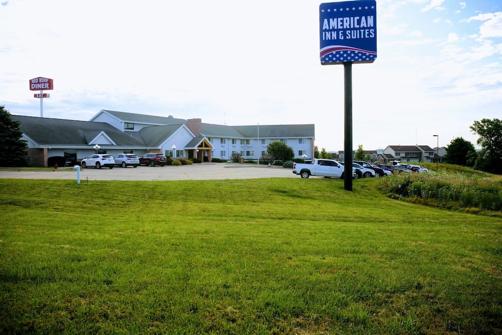 American Inn and Suites featured exterior or lobby in Peosta, IA — similar hotel