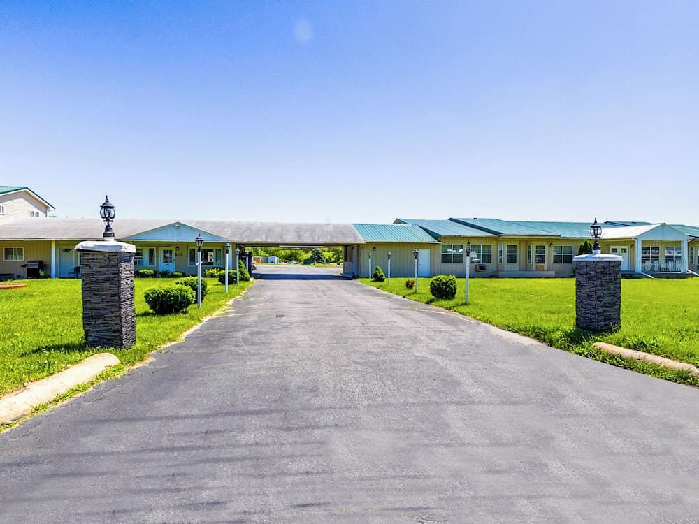 Country Hearth Inn & Suites By OYO Sturgis featured exterior or lobby in Sturgis, MI — similar hotel