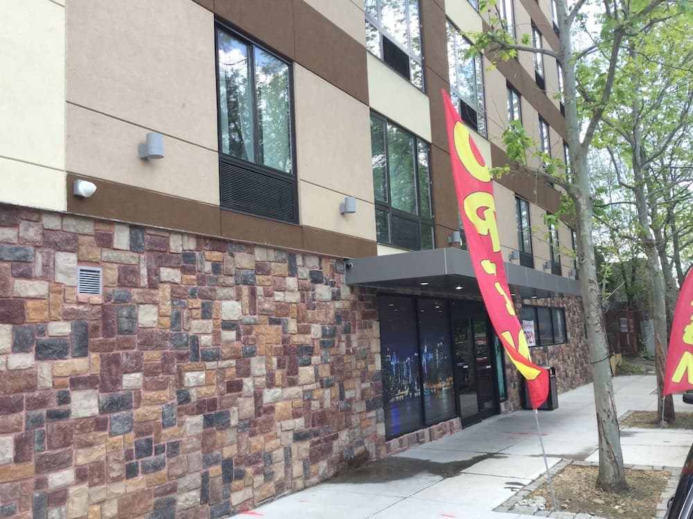 Ramada by Wyndham Bronx Terminal featured exterior or lobby in Bronx, NY — similar hotel