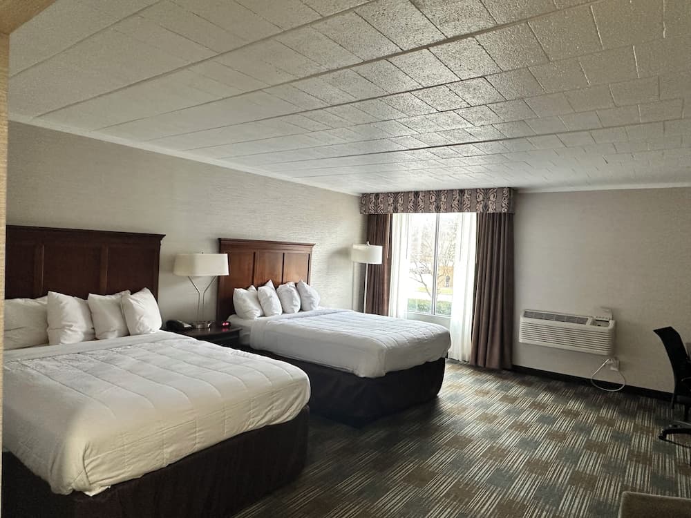 Finger Lakes Inn & Suites featured exterior or lobby in Bath — similar hotel
