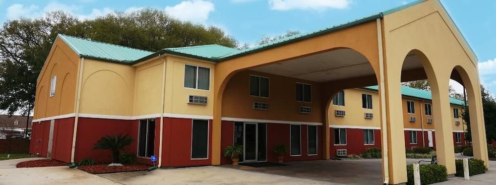 Riverside Hotel featured exterior or lobby in Belle Chasse, LA — similar hotel