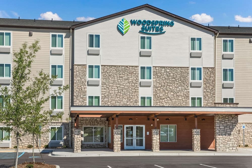 WoodSpring Suites Greenville Haywood Mall featured exterior or lobby in Greenville, SC — similar hotel