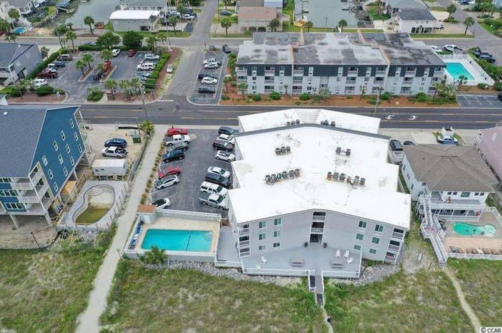 Beachy Condo Right on Oceanfront featured exterior or lobby in North Myrtle Beach, SC — similar hotel
