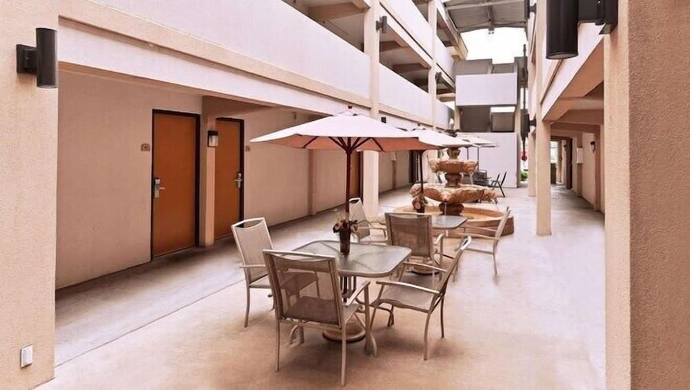 Executive Inn & Suites featured exterior or lobby in Goodlettsville, TN — similar hotel
