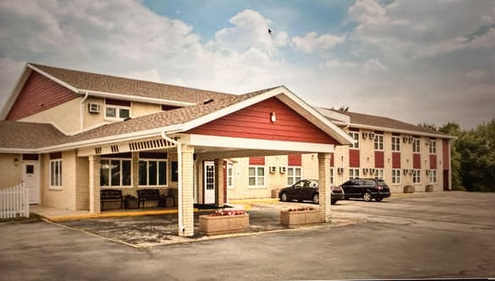 Travel Inn featured exterior or lobby in Denison, IA — similar hotel