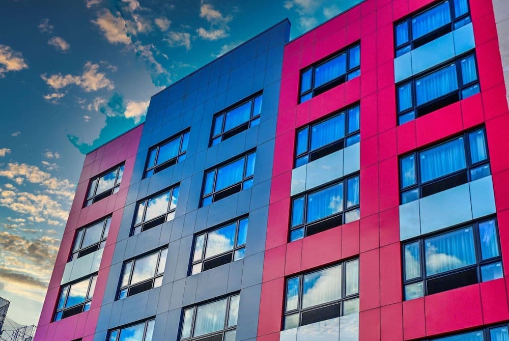 Super 8 by Wyndham Bronx Near Botanical Garden featured exterior or lobby in Bronx, NY — similar hotel