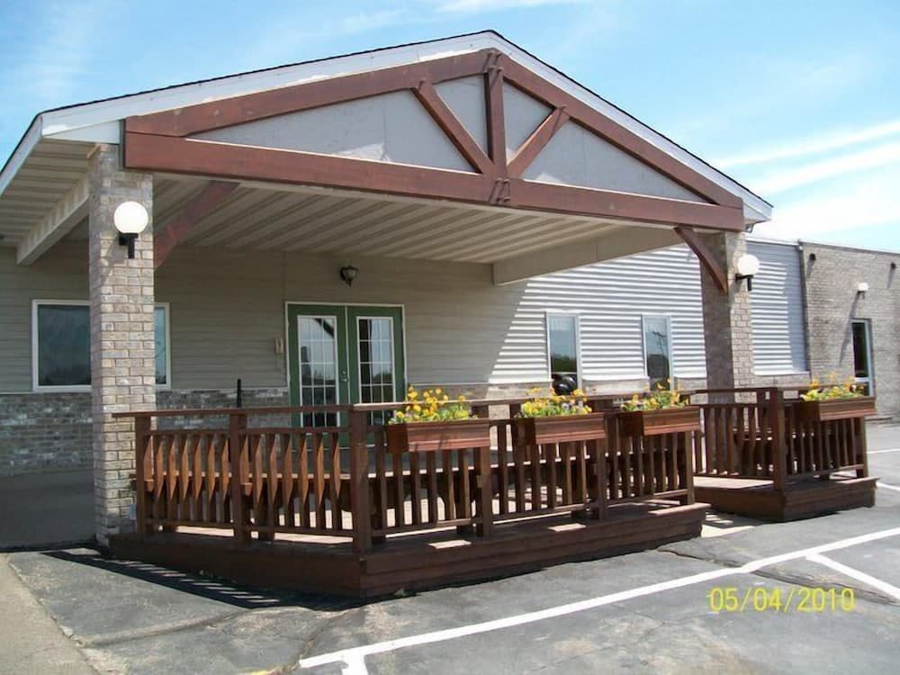 Woodlands Inn & Suites featured exterior or lobby in Medford, WI — similar hotel