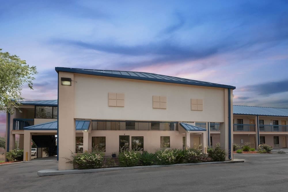 Super 8 by Wyndham Hattiesburg South featured exterior or lobby in Hattiesburg, MS — similar hotel