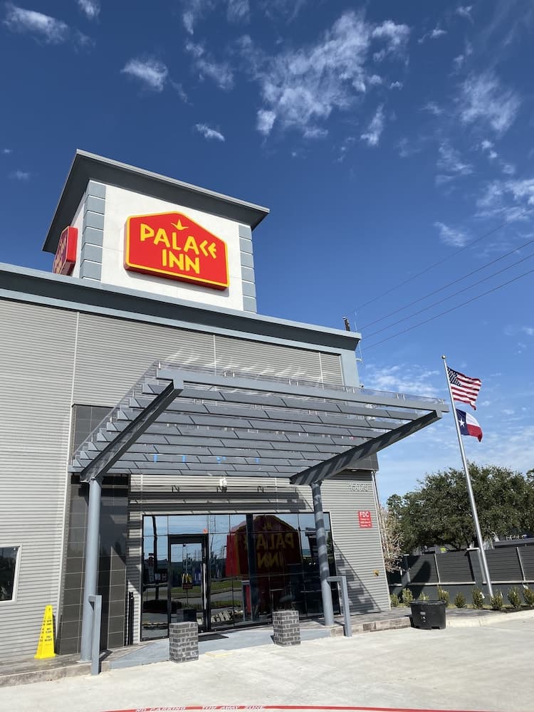 Palace Inn featured exterior or lobby in Humble, TX — similar hotel