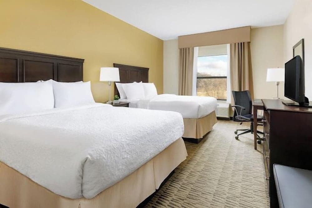 Countryside Inn and Suites featured exterior or lobby in Jackson, MI — similar hotel