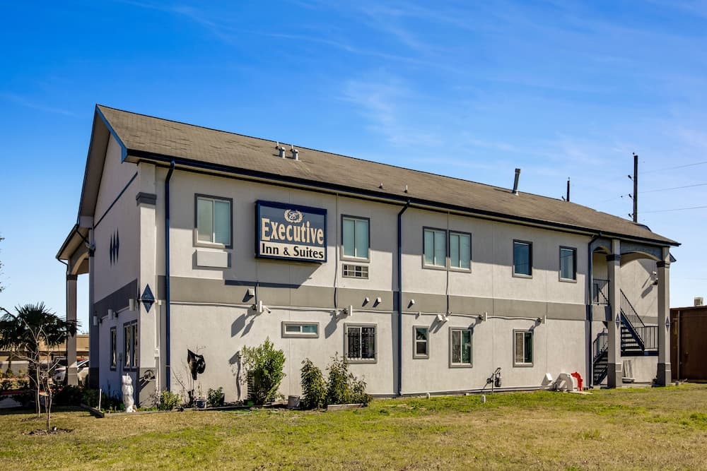 Executive Inn & Suites featured exterior or lobby in Stafford, TX — similar hotel