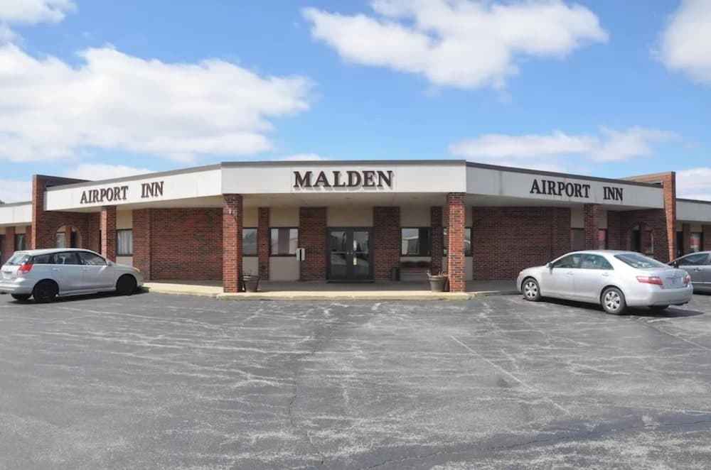 OYO Malden Airport Inn featured exterior or lobby in Malden, MO — similar hotel