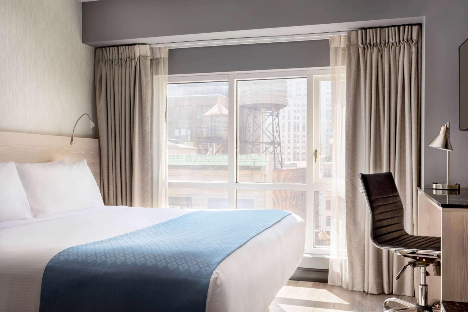 Deluxe Queen Room with Gotham View - Non-Smoking at Wingate by Wyndham New York Midtown South/5th Ave in New York, NY