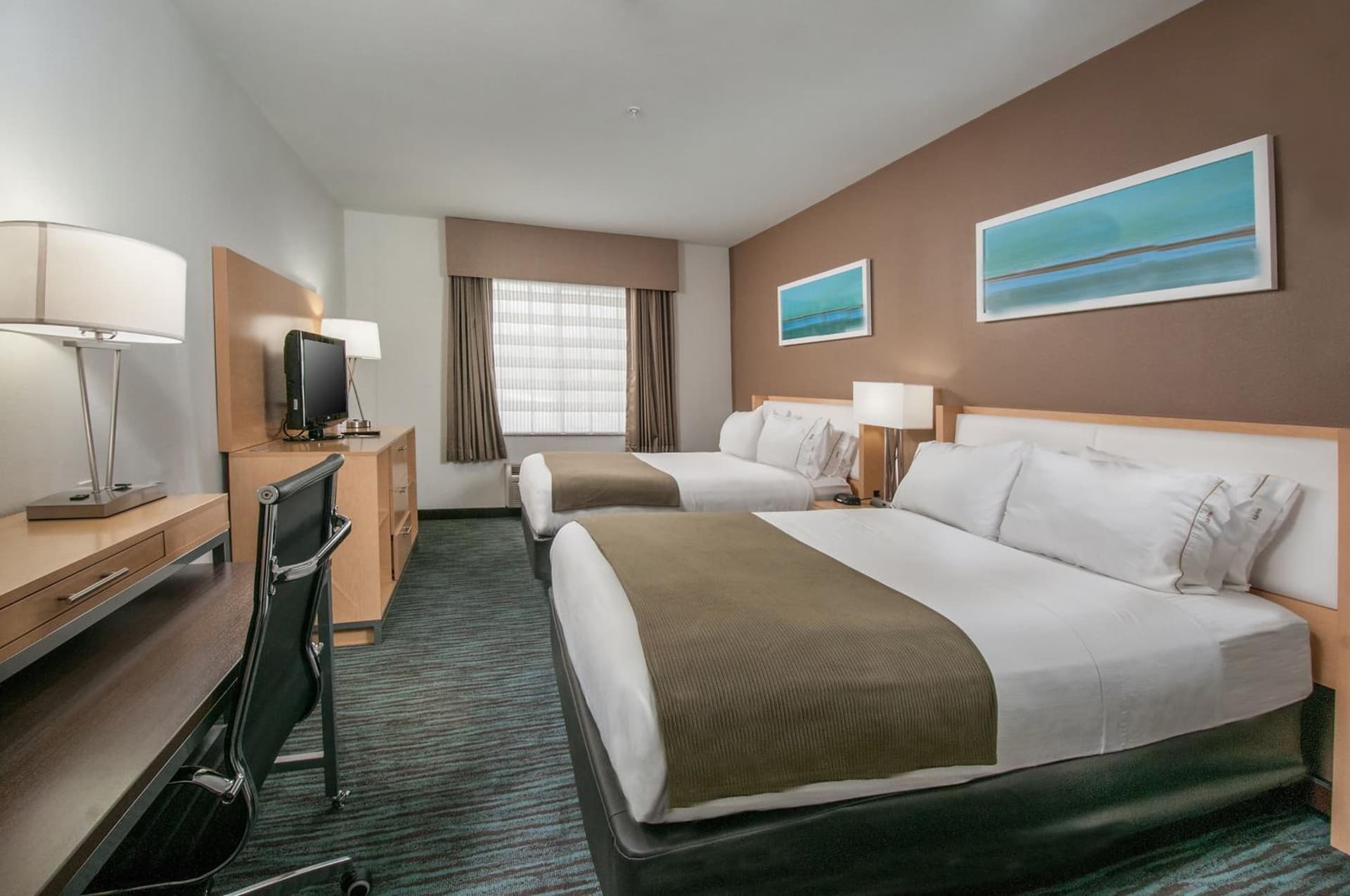 One-Bedroom Suite with Two Queen Beds at Holiday Inn Express Hotel & Suites San Antonio - Rivercenter Area by IHG in San Antonio, TX