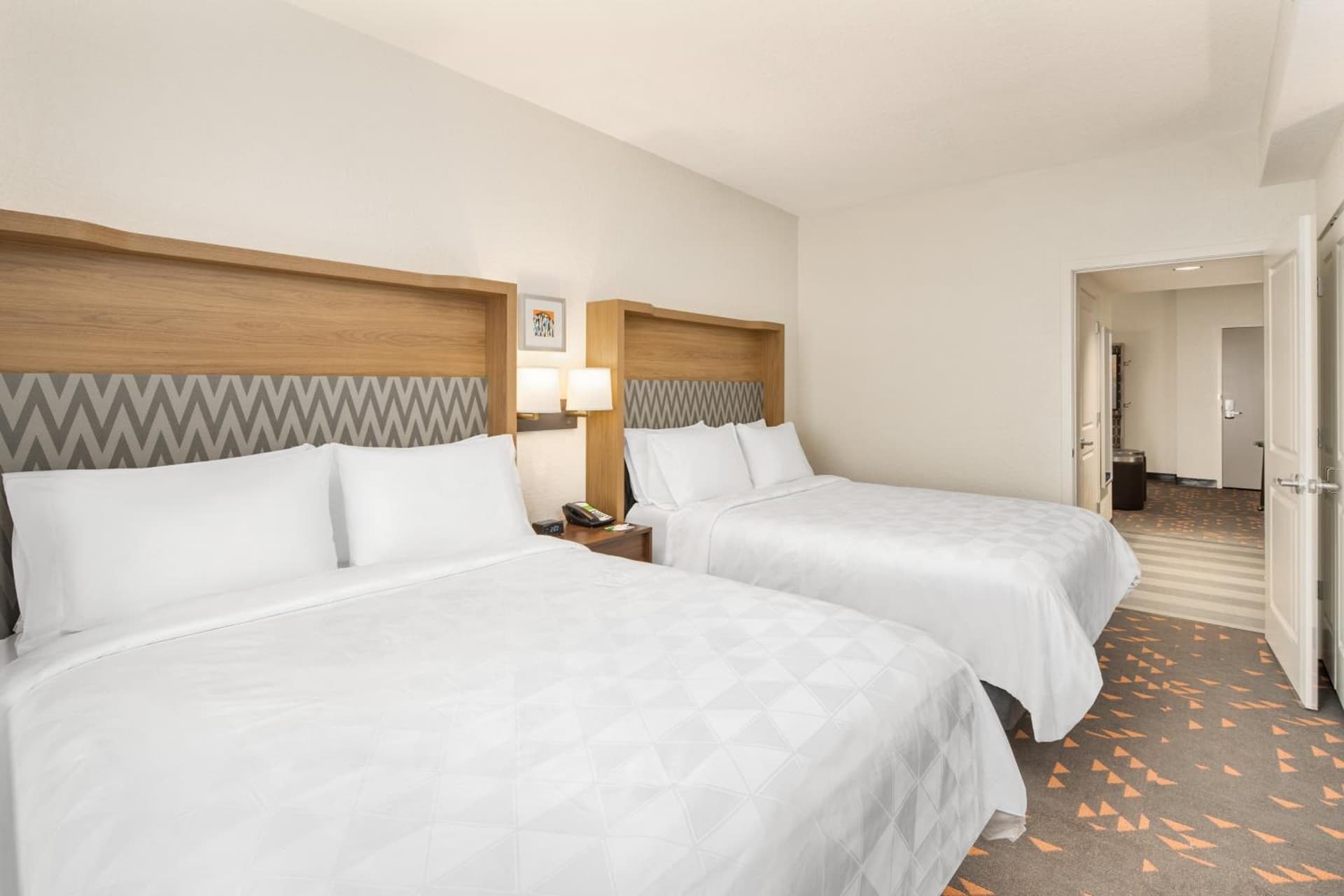 Queen Suite with Two Queen Beds at Holiday Inn & Suites Orlando - I-Drive - Theme Parks by IHG in Orlando, FL