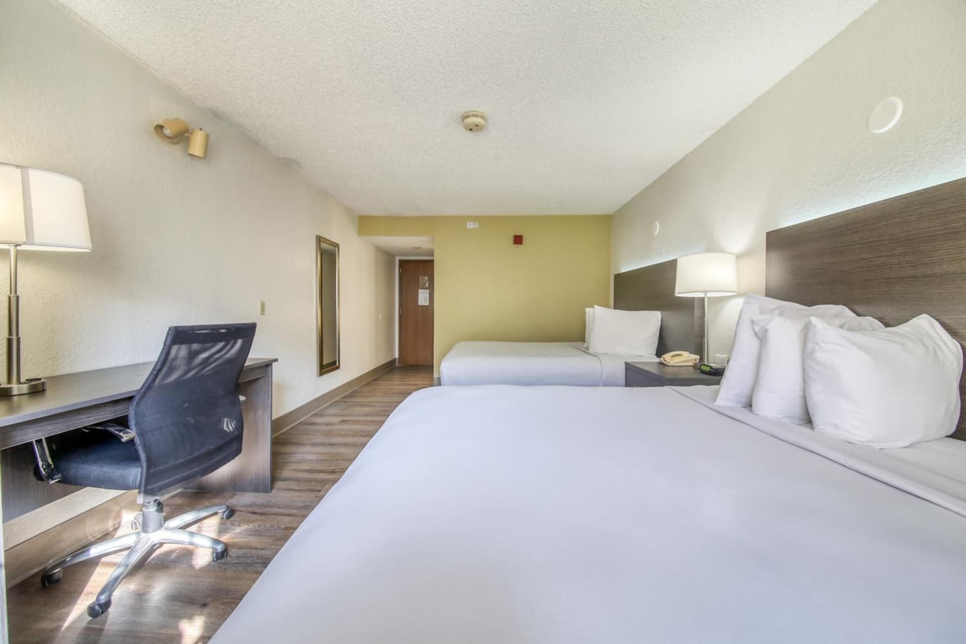 Queen Room with Two Queen Beds at Baymont by Wyndham Orlando-International Dr-Universal Blvd in Orlando, FL